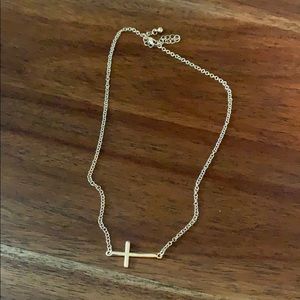 Gold side cross necklace